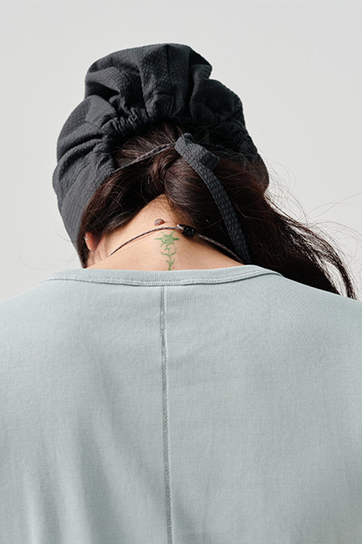 コットン製ドロストリング付き帽子NLBLAPS013